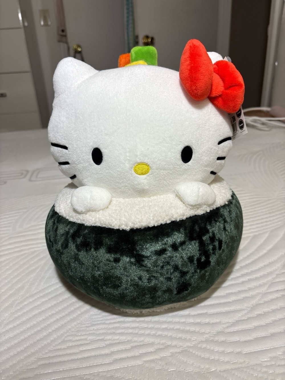 Sanrio Hello Kitty Plush with Red Bow and Dark Green Base